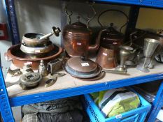 A selection of copper and brassware to include kettles, pans, ornaments, pot stand etc