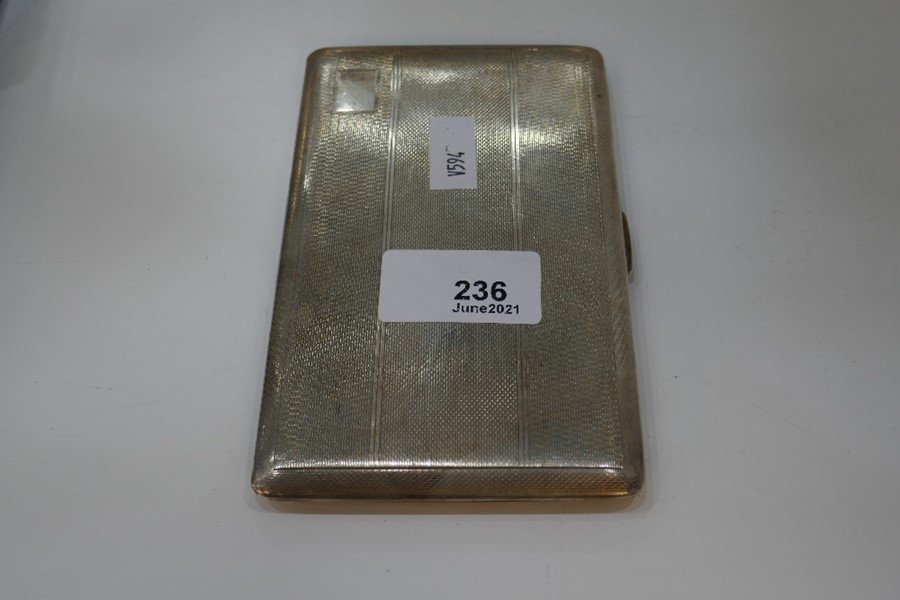 A large heavy silver cigarette case with gilt interior and engine turned exterior, Chester 1946, Don - Image 4 of 6