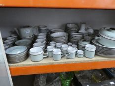 A large quantity of Denby dinner and tea ware 'Romance' to include plates, serving dishes, bowls, ju