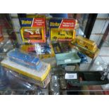 A selection of boxed and unboxed Dinky cars, to include buses, etc