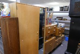 A 1970s style Teak bedroom suite by Stagg, to include wardrobe and dressing table