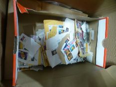 One box of stamps mainly loose and First Day Covers
