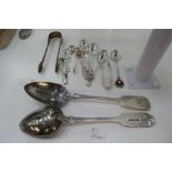 A silver lot comprising of various spoons, foreign flatware and tongs, 8.69 ozt approx