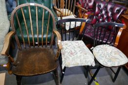 Two stickback chairs, and three other chairs
