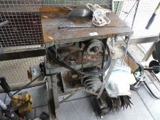 A mounted table saw on wheeled bench