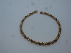 9ct yellow gold ruby and diamond bracelet, 19cm, marked 375, approx 5.8g
