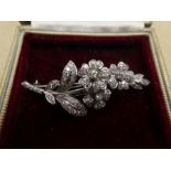18ct white gold, floral design brooch inset with many diamonds, approx 5.5cm