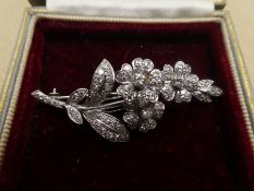 18ct white gold, floral design brooch inset with many diamonds, approx 5.5cm