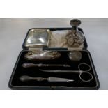 A silver manicure set hallmarked Birmingham 1918, G and C Ltd. Along with a silver sterling covered