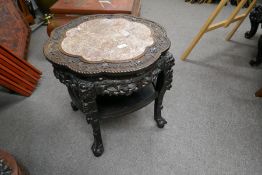 Chinese carved hardwood 2 tier table having a rouge marble top - width 56cm