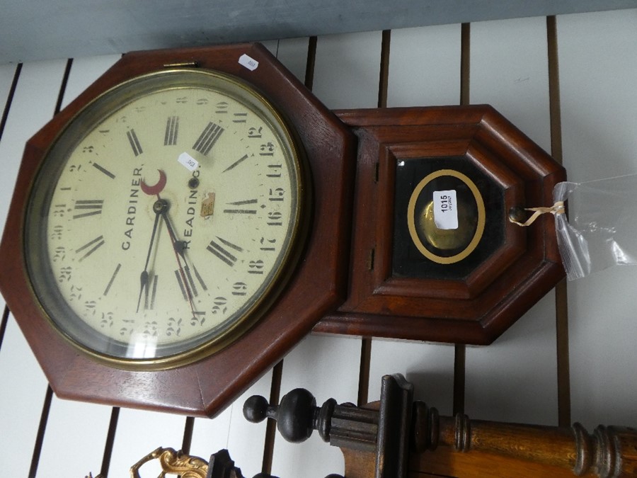 Octagonal cased pendulum clock, possibly Post Office or Railway, with key and pendulum