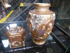 A Satsuma hexagonal pot and cover decorated with figures and a Satsuma vase