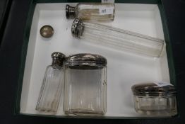 Five silver topped glass bottles, AF, weight of silver total approx 2.61 ozt