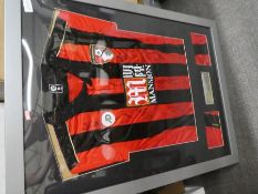 A signed, framed Bournemouth football shirt 2016/2017