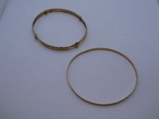 Two 9ct yellow gold bangles, the largest 7cm diameter, both marked 375, 9.4g approx