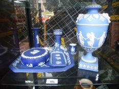 A 19th Century Wedgwood Jasperware urn and cover decorated classical maidens, other Jasperware items