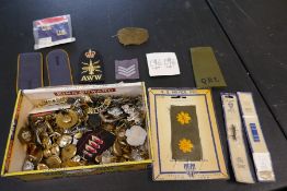 A quantity of military buttons, badges and similar