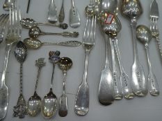 A large quantity of heavy silver flatware of various dates and makers. Including Georgian and Victor