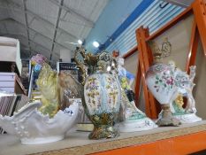 A large selection of ceramic figures and urns in Capodimonte style