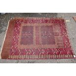 An old Bokhara and 2 others the largest 189 x 147cm and a quantity of cushions
