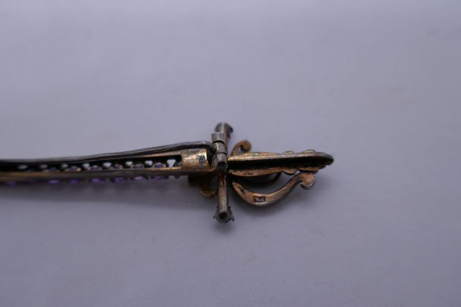 Victorian brooch in the form of a sword inset with 11 amethyst and seed pearls, marked 900, 6cm - Image 2 of 3