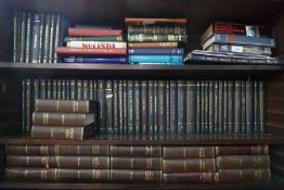 Three shelves of books incl. first edition Dickens books