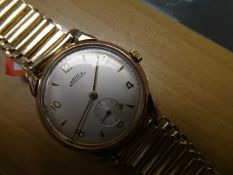 Vintage 'Arnex' 9ct gold watch, on a gold plated strap.