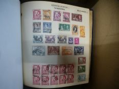 A box of stamps, some in albums