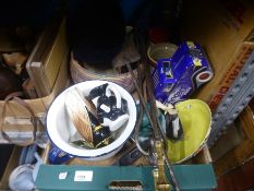 A shelf of mixed collectables to include wooden shoe lasts, horse hat, metalware, vintage games, tur