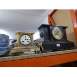 Two early 20th Century mantle clocks, one black slate with brass mounts and one pale Onyx and blue c