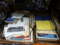 Two boxes of ephemera to include maps, vintage writing books, postcards, pictures, etc