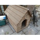 A large wooden dog kennel