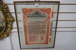 A 1911 Imperial Chinese Government Railway share certificate for £100, framed