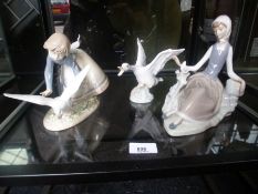 A Lladro figure of a girl chasing goose and 2 others