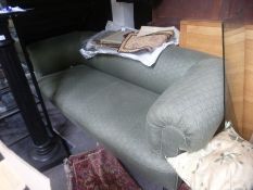 Antique Chesterfield sofa having turned front legs