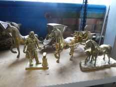 A selection of heavy style brass ornaments to include horse and carts, Blacksmith, etc