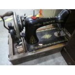 A selection of various Singer sewing machines hand and electric powered