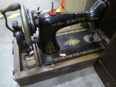 A selection of various Singer sewing machines hand and electric powered