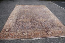 A Belgium style large carpet having floral design