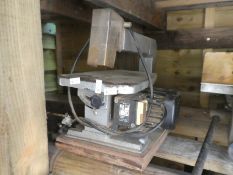 Three woodworking power tools including Band Saw, Router, Bench mortar, etc
