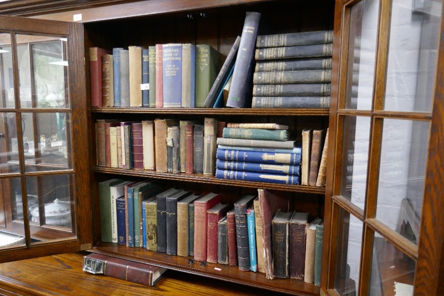 Three shelves of antiquarian books and others