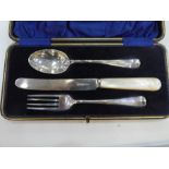 A set of silver fork, knife and spoon, cased, hallmarked Sheffield 1933 George Bishop and Sons, heav