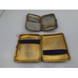Two silver hallmarked cigarette cases, one silver gilt with engraved E H M G from C.R.O. 1953 marked