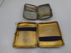 Two silver hallmarked cigarette cases, one silver gilt with engraved E H M G from C.R.O. 1953 marked