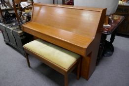 A 1970s Kemble small upright piano, having teak case, with a Falstaff duet stool, having rising lid