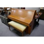 A 1970s Kemble small upright piano, having teak case, with a Falstaff duet stool, having rising lid