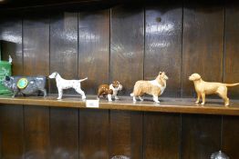 A Beswick pot bellied pig and 4 Beswick dog figures