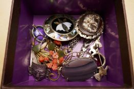 A quantity of mostly silver costume jewellery to include African design brooch, cameo brooch depicti