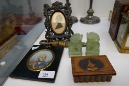 An antique and portrait miniature of naval figure, a silhouette, a pair of Jade dogs and sundry