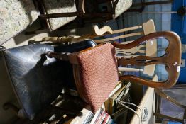 A leather chair on cabriole legs and two other chairs